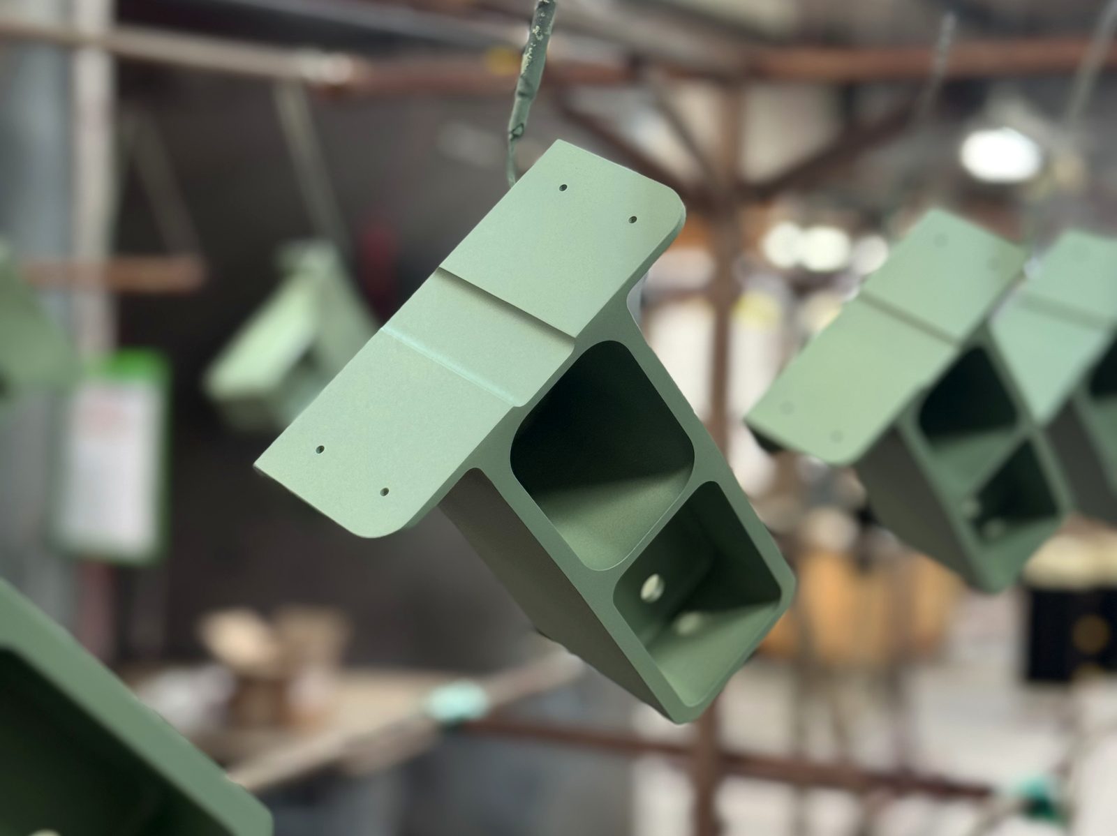 Powder coated brackets on the conveyor line