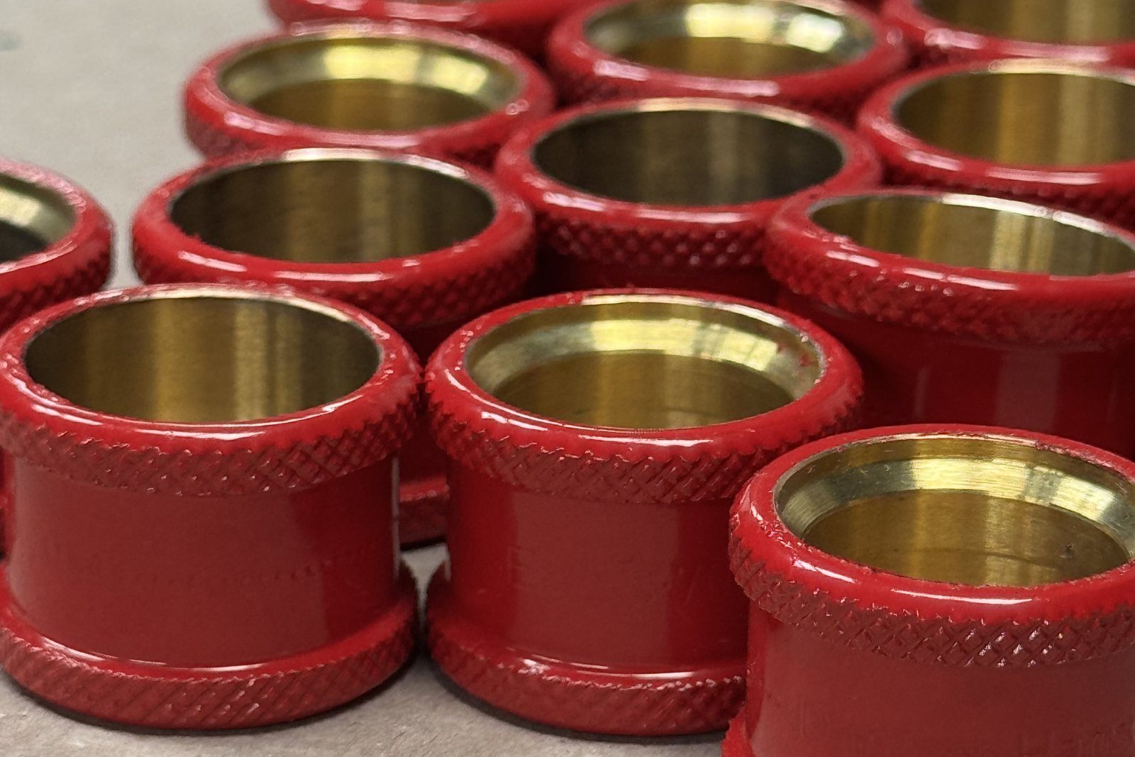 Red powder coated brass couplings with masked bores