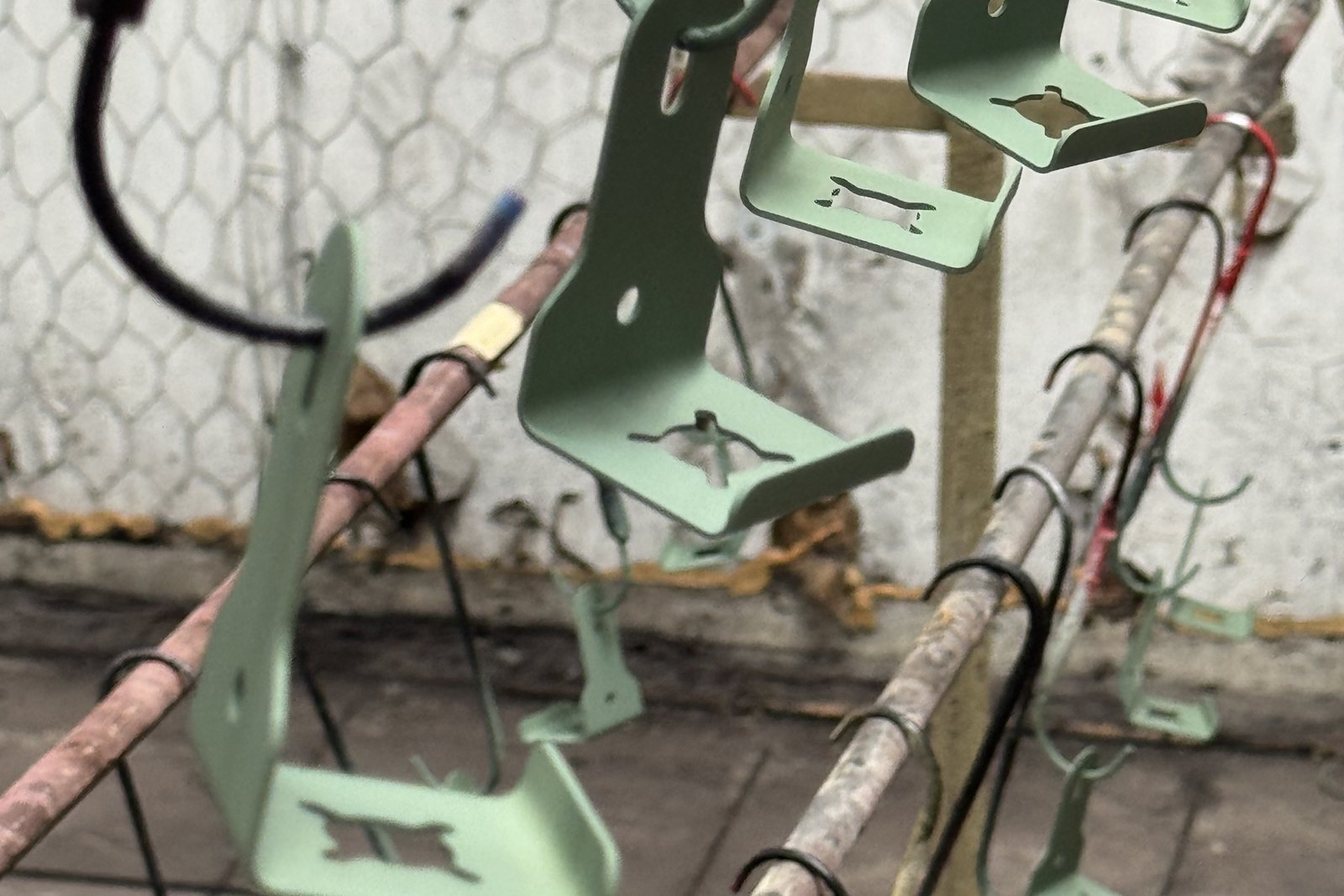 Racked brackets after powder coating